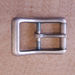 Boucle à rouleau pour sangle de 25 mm finition vieux cuivre